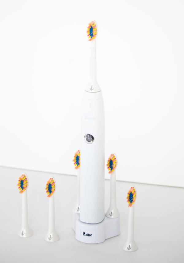 Six Heads of the Electronic Flosser Toothbrush at LBailar